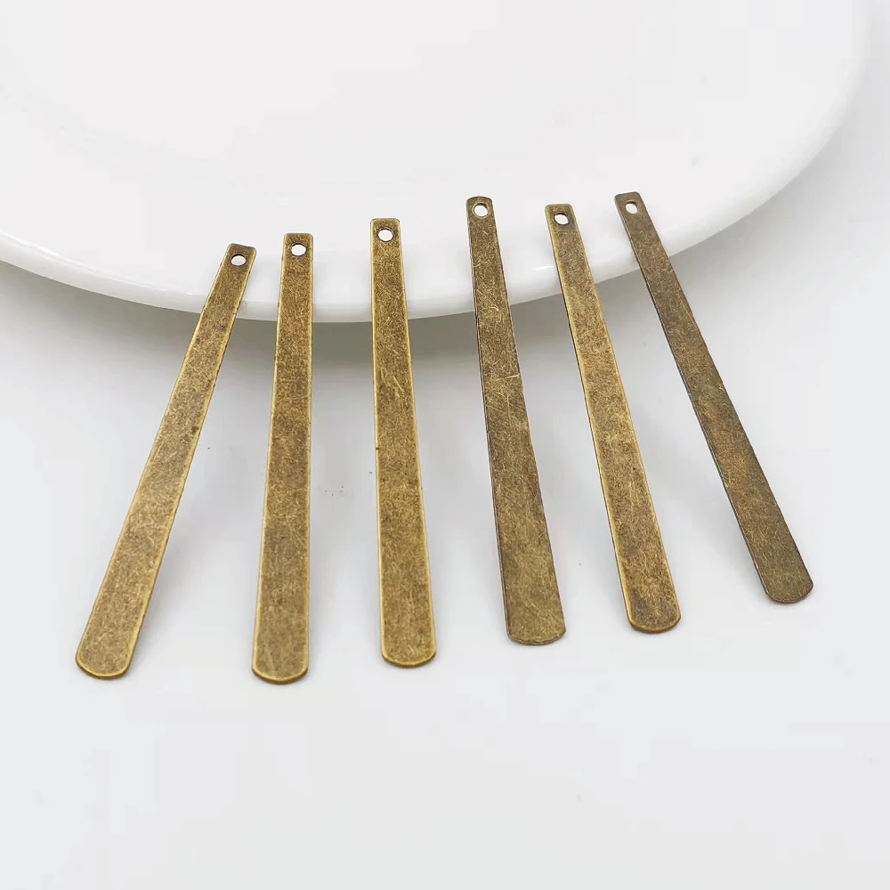 30pcs/lot 48*5mm Antique bronze Metal Filigree Flowers Slice Long Strip Charms base Setting Jewelry DIY Component Making 
30pcs/lot 48*5mm Antique bronze Metal Filigree Flowers Slice Long Strip Charms base Setting Jewelry DIY Component Making