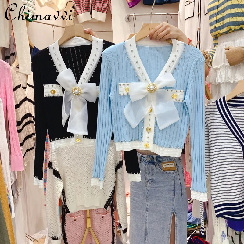 Sweet Fashion Lady Slimming Big Bow Patched Short Puff Sleeve Knitted Cardigan V-neck Single-breasted Short Top
Sweet Fashion Lady Slimming Big Bow Patched Short Puff Sleeve Knitted Cardigan V-neck Single-breasted Short Top