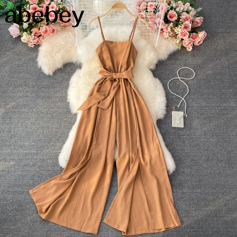 Women Sexy Backless Strap Rompers Korean Sexy Sleeveless Sashes Solid Jumpsuits Summer Chic Split Beach Long Rompers
Women Sexy Backless Strap Rompers Korean Sexy Sleeveless Sashes Solid Jumpsuits Summer Chic Split Beach Long Rompers