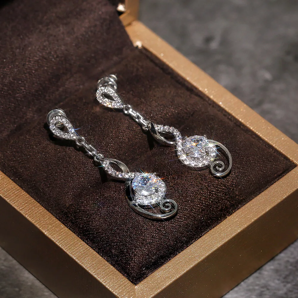 Luxury Female White Zircon Drop Earrings Charm Silver Color Dangle Earrings For Women Elegant Round Crystal Wedding Earrings
Luxury Female White Zircon Drop Earrings Charm Silver Color Dangle Earrings For Women Elegant Round Crystal Wedding Earrings