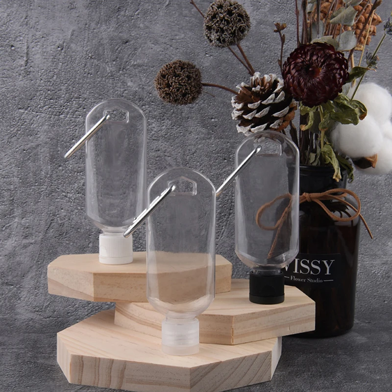 5pcs 50ml Refillable Hook Bottle With Key Chain Clip Flip Cover Transparent Container Cosmetic Lotion Container
5pcs 50ml Refillable Hook Bottle With Key Chain Clip Flip Cover Transparent Container Cosmetic Lotion Container