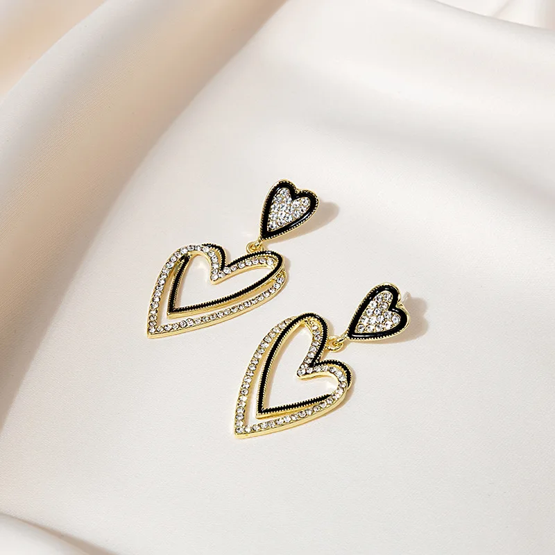925 Silver Needle Double Heart Earrings Diamond Hollow Earrings Fashion Metal Irregular Heart Earrings Female Jewelry
925 Silver Needle Double Heart Earrings Diamond Hollow Earrings Fashion Metal Irregular Heart Earrings Female Jewelry