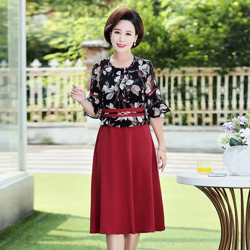 2021 Print Women Summer Dresses Vintage Plus Size Casual Short Sleeve O-neck Vestidos Elegant Fake Two Piece Chiffon Dress Y917 
2021 Print Women Summer Dresses Vintage Plus Size Casual Short Sleeve O-neck Vestidos Elegant Fake Two Piece Chiffon Dress Y917