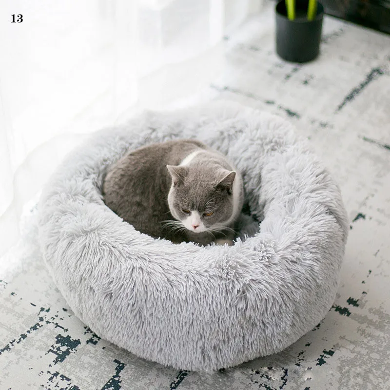 Round Pet Dog Bed Soft And Fluffy Comfortable And Breathable Cat And Dog Kennel Plush Donut Pet House Dog Beds For Large Dogs 
Round Pet Dog Bed Soft And Fluffy Comfortable And Breathable Cat And Dog Kennel Plush Donut Pet House Dog Beds For Large Dogs