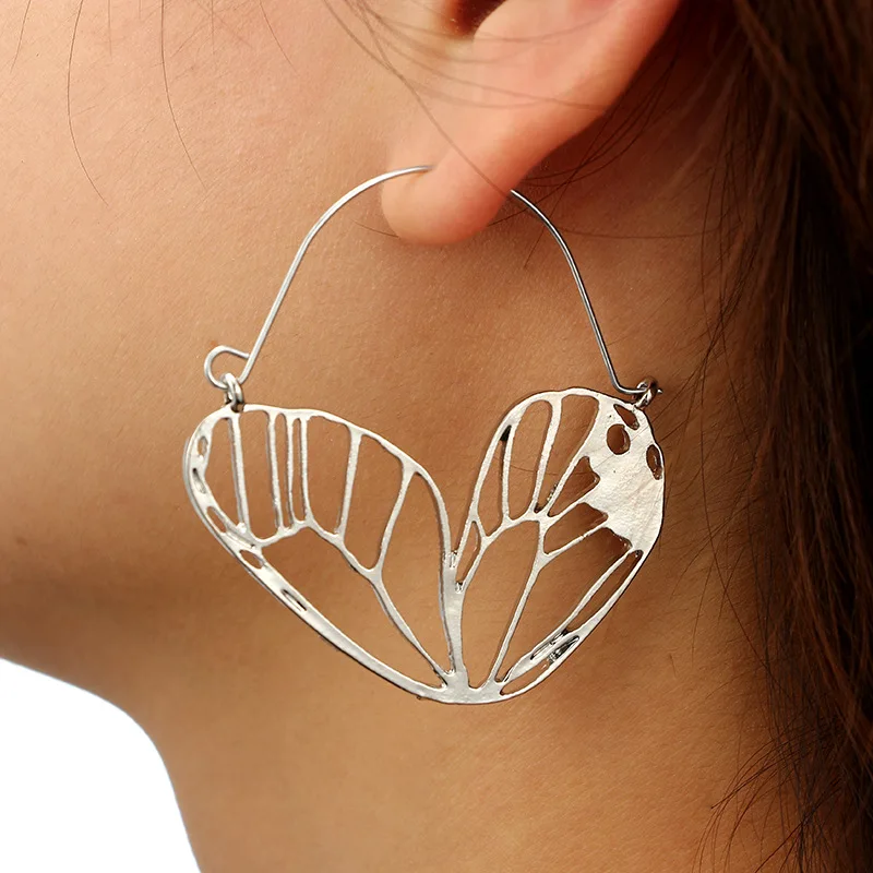 Exaggerated retro Earrings female geometric butterfly wing hollow Earrings simple irregular earrings earrings
Exaggerated retro Earrings female geometric butterfly wing hollow Earrings simple irregular earrings earrings