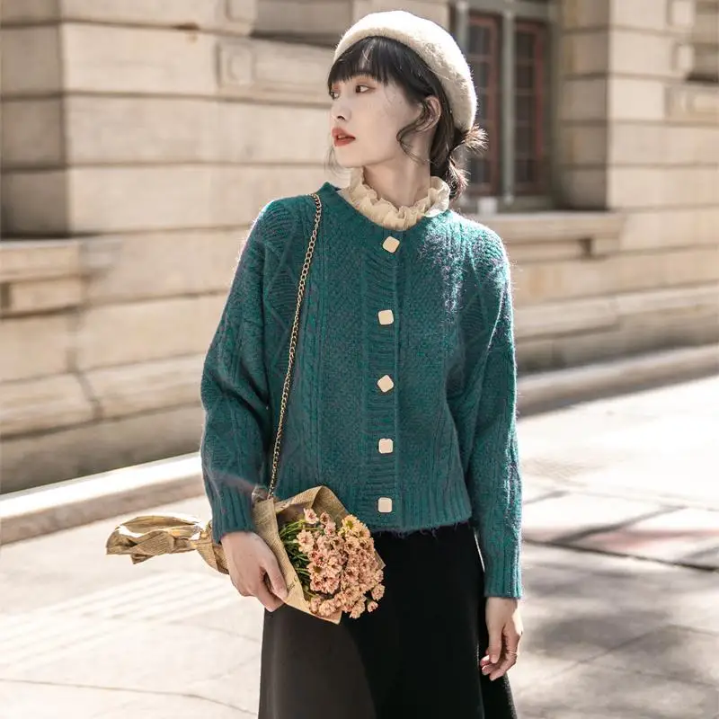 2021 spring Korean version of solid color new retro coarse twist short cardigan women loose knitted sweater student coat
2021 spring Korean version of solid color new retro coarse twist short cardigan women loose knitted sweater student coat