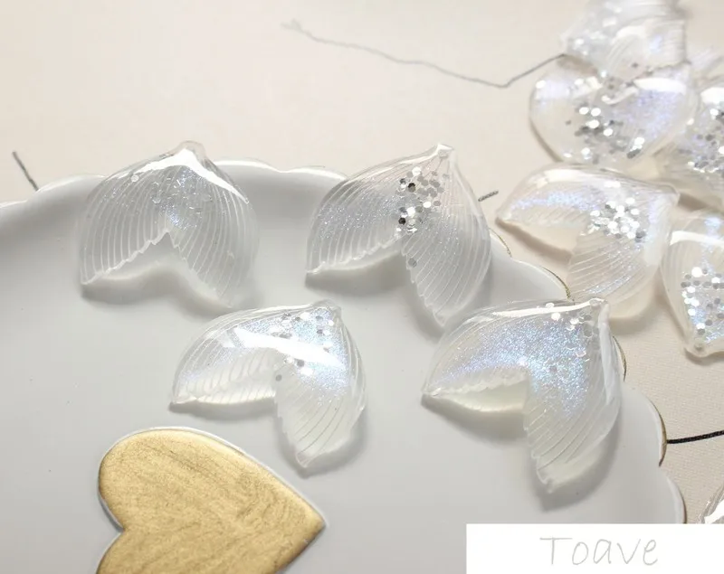4pcs Transparent Sequins Flash Sand Mermaid Tail Pendant Resin Material DIY Earrings Accessories
4pcs Transparent Sequins Flash Sand Mermaid Tail Pendant Resin Material DIY Earrings Accessories