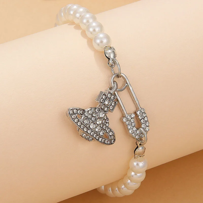 Fashion Pearl Chain Saturn Planet Pendant Necklaces Aesthetic Zircon Silver Plated Saturn Planet Bracelets For Women Jewelry 
Fashion Pearl Chain Saturn Planet Pendant Necklaces Aesthetic Zircon Silver Plated Saturn Planet Bracelets For Women Jewelry