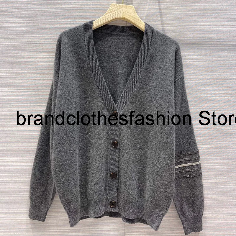 Женский трикотажный кашемировый кардиган, Универсальный мягкий свитер с V-образным вырезом, открытыми плечами и цепочками на осень, 2021
Женский трикотажный кашемировый кардиган, Универсальный мягкий свитер с V-образным вырезом, открытыми плечами и цепочками на осень, 2021