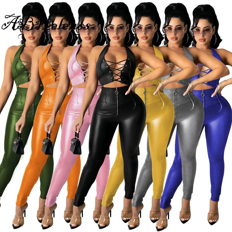 Pu Leather Two Piece Set Women Cross Bandage Crop Top And High Waist Zipper Skinny Trousers Nightclub Summer 2021 Tracksuits
Pu Leather Two Piece Set Women Cross Bandage Crop Top And High Waist Zipper Skinny Trousers Nightclub Summer 2021 Tracksuits