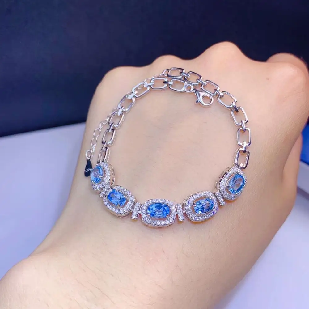 Модный Круглый Т-образный браслет с натуральным голубым топазом, браслет с натуральным драгоценным камнем, 925 серебряный браслет для девушек, ювелирные изделия для вечеринки
Модный Круглый Т-образный браслет с натуральным голубым топазом, браслет с натуральным драгоценным камнем, 925 серебряный браслет для девушек, ювелирные изделия для вечеринки