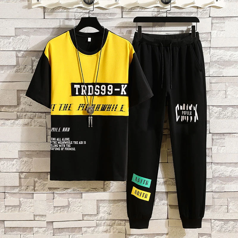 Spring and Summer Short-sleeved Suits Men's Leisure Sports Loose 2 Sets Men's Ankle Trousers + T-shirt Youth Suit
Spring and Summer Short-sleeved Suits Men's Leisure Sports Loose 2 Sets Men's Ankle Trousers + T-shirt Youth Suit