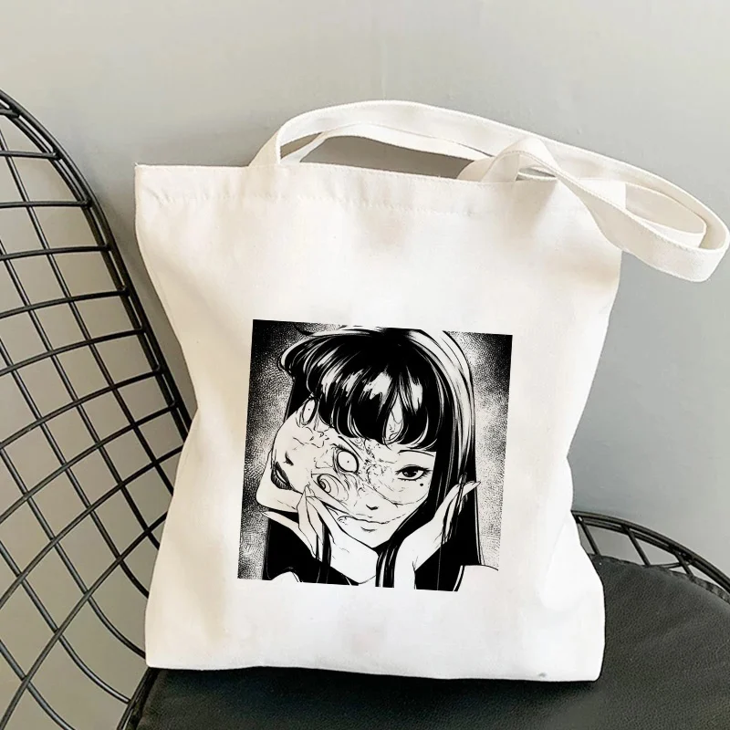 Японские Женские сумки Tomie в стиле аниме, Готическая холщовая сумочка в стиле Харадзюку, вместительная сумка-шоппер с ужасным мультяшным пр...
Японские Женские сумки Tomie в стиле аниме, Готическая холщовая сумочка в стиле Харадзюку, вместительная сумка-шоппер с ужасным мультяшным пр...