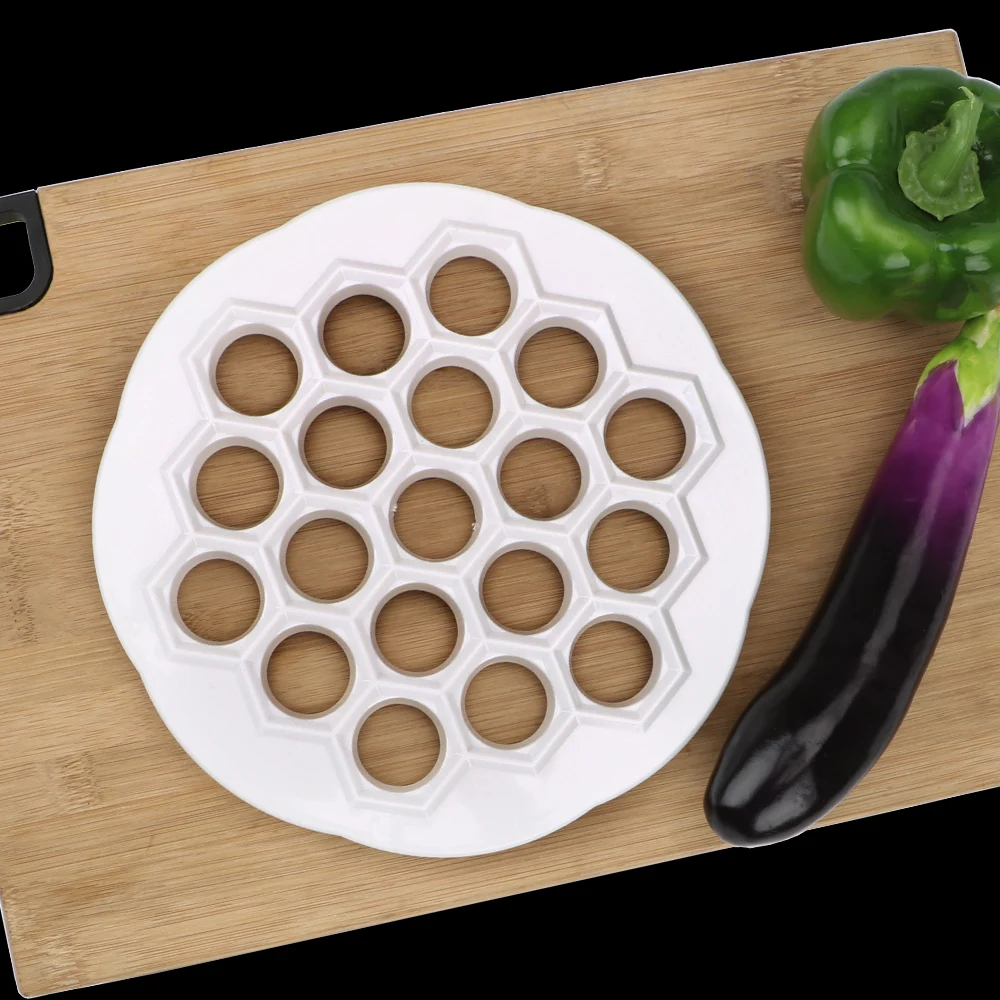 19 Holes Maker Dough Press Kitchen Gadgets Cooking Pastry Tool Plastic Dumpling Ravioli Maker Device DIY Dumpling Mold
19 Holes Maker Dough Press Kitchen Gadgets Cooking Pastry Tool Plastic Dumpling Ravioli Maker Device DIY Dumpling Mold