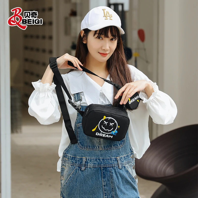 BQ Fashion INS Marshmello Cute Smile Face Mini Crossbody Messenger Single Shoulder Nylon Bags Set With Small Zipper Purses 
BQ Fashion INS Marshmello Cute Smile Face Mini Crossbody Messenger Single Shoulder Nylon Bags Set With Small Zipper Purses