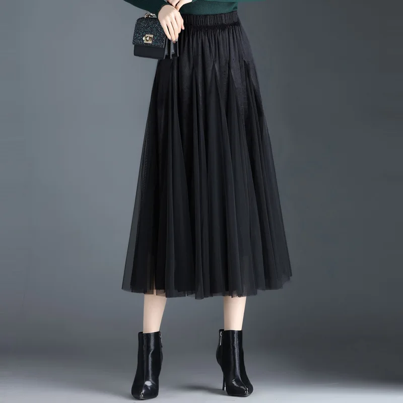 Autumn Winter Elastic High Waist Solid Color Mesh Pleated Skirt Women Vintage Elegant Loose Big Swing Casual Long Skirts 2138
Autumn Winter Elastic High Waist Solid Color Mesh Pleated Skirt Women Vintage Elegant Loose Big Swing Casual Long Skirts 2138