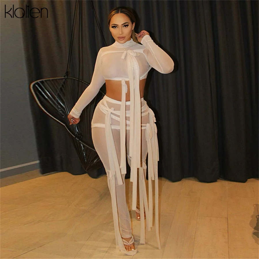 KLALIEN Fashion Sexy Mesh See Through Bandage Solid Long Sleeve Top and Trousers Two Piece Set Women Summer New High Street Set
KLALIEN Fashion Sexy Mesh See Through Bandage Solid Long Sleeve Top and Trousers Two Piece Set Women Summer New High Street Set