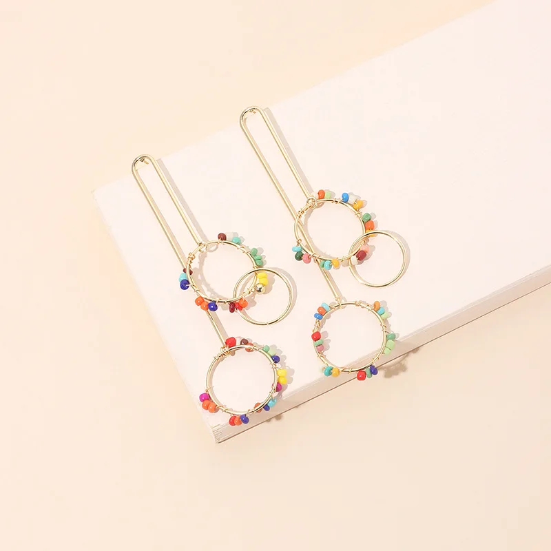 New daisy flower round geometric earrings women's bohemian long tassels colored beads golden earrings gift accessories
New daisy flower round geometric earrings women's bohemian long tassels colored beads golden earrings gift accessories
