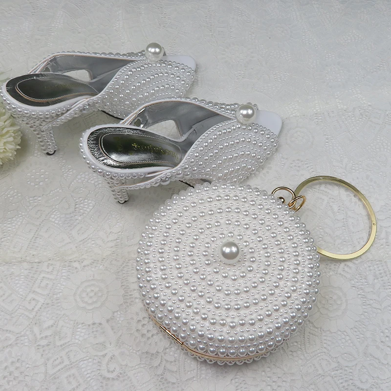 BaoYaFang 9cm White Pearl woman wedding shoes And Bags woman High heels shoes ladies party dress shoes Open Toe Slingbacks
BaoYaFang 9cm White Pearl woman wedding shoes And Bags woman High heels shoes ladies party dress shoes Open Toe Slingbacks