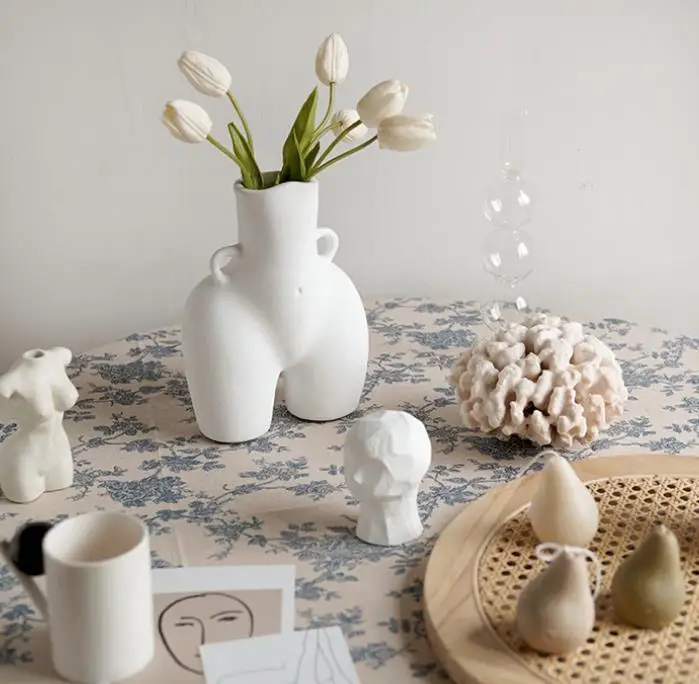 Creative ceramic vase with dried flower arrangement for table decoration Modern body chest vase handicraft home decoration
Creative ceramic vase with dried flower arrangement for table decoration Modern body chest vase handicraft home decoration