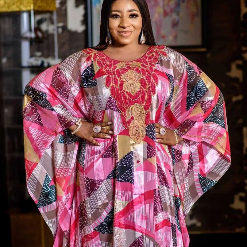 Африканские платья для женщин Risbrdfly, осень 2021, Дашики, Лидер продаж, бусины, халат, африканская Женская абайя, длинное платье из Дубая, кафтан
Африканские платья для женщин Risbrdfly, осень 2021, Дашики, Лидер продаж, бусины, халат, африканская Женская абайя, длинное платье из Дубая, кафтан