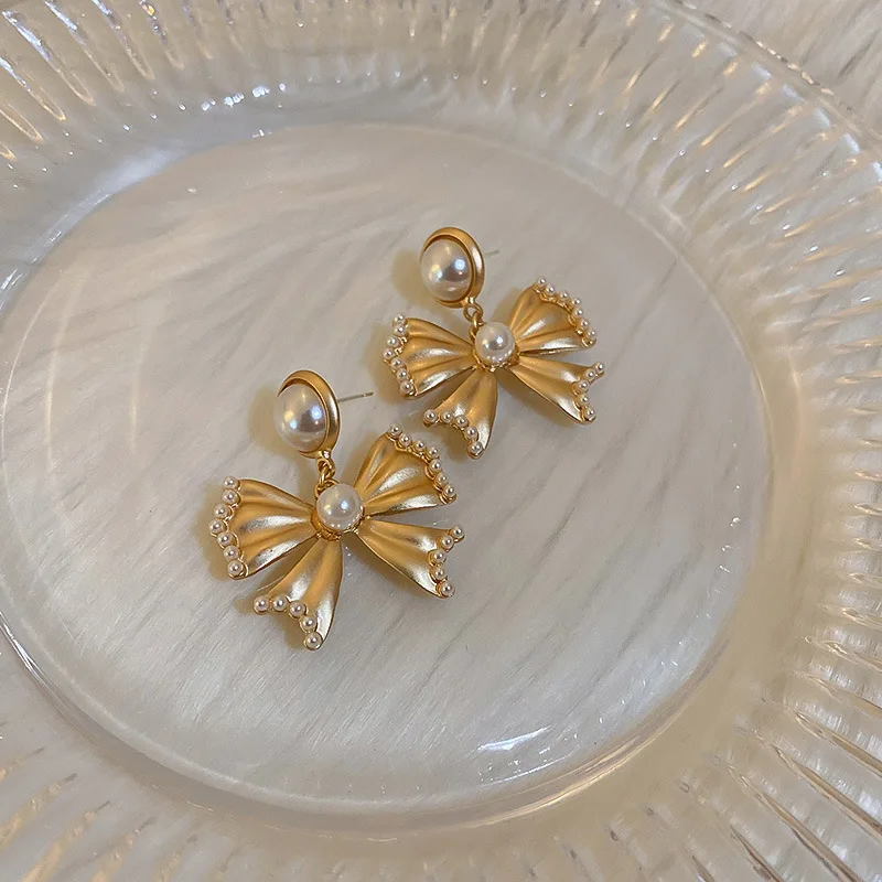 LOVOACC Romantic Gold Color Metal Bowknot Pendant Earrings for Women Girls Simulation Pearl Dangle Earrings Accessories Gifts
LOVOACC Romantic Gold Color Metal Bowknot Pendant Earrings for Women Girls Simulation Pearl Dangle Earrings Accessories Gifts