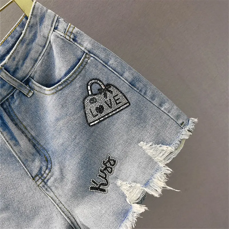 Fashion Diamond Tassel Hole Denim Shorts Women 2021 Summer New High waist Female Casual Jeans Shorts Plus Size Lady Short Pants
Fashion Diamond Tassel Hole Denim Shorts Women 2021 Summer New High waist Female Casual Jeans Shorts Plus Size Lady Short Pants