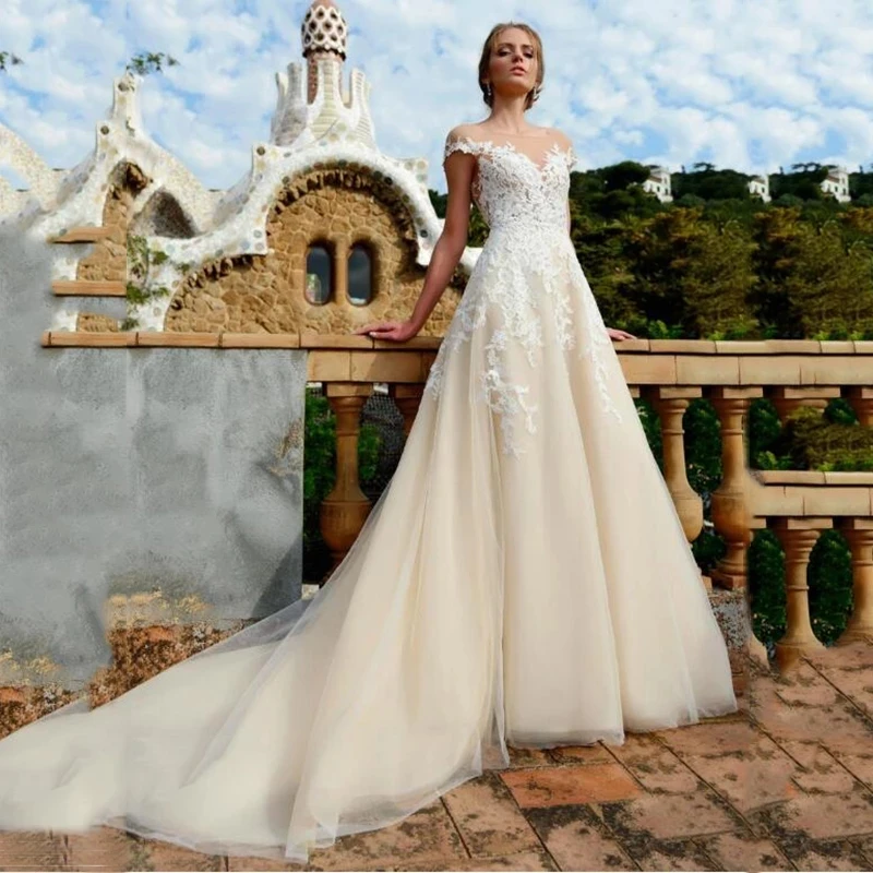 Beige Wedding Dress Boho Lace Appliques Tulle Cap Sleeve Princess Bridal Dress Women Plus Size Wedding Gowns
Beige Wedding Dress Boho Lace Appliques Tulle Cap Sleeve Princess Bridal Dress Women Plus Size Wedding Gowns