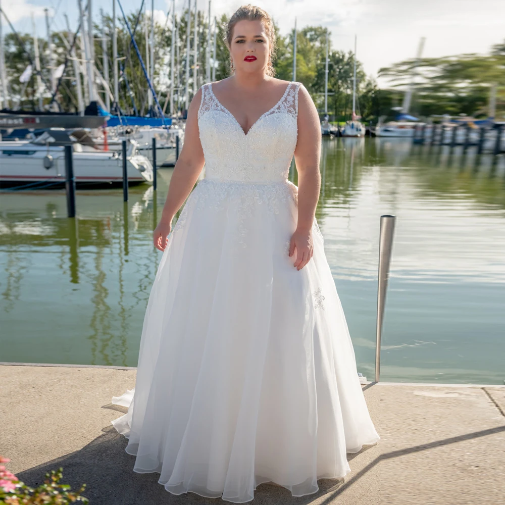 Plus Size Wedding Dress Elegant V-neck Sleeveless Organza A-line Bridal Gowns Lace Up Sweep Train Custom Made Vestido De Novia
Plus Size Wedding Dress Elegant V-neck Sleeveless Organza A-line Bridal Gowns Lace Up Sweep Train Custom Made Vestido De Novia