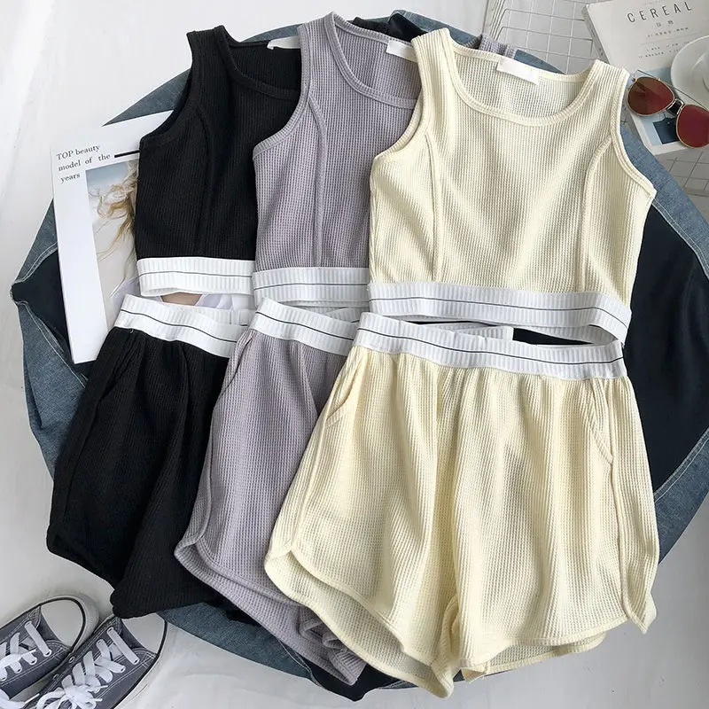 Summer Waffle Yoga Suit Short Vest Loose Casual Wide-leg Shorts Women's Outer Wear Sportswear Two-piece Sweat Suits
Summer Waffle Yoga Suit Short Vest Loose Casual Wide-leg Shorts Women's Outer Wear Sportswear Two-piece Sweat Suits