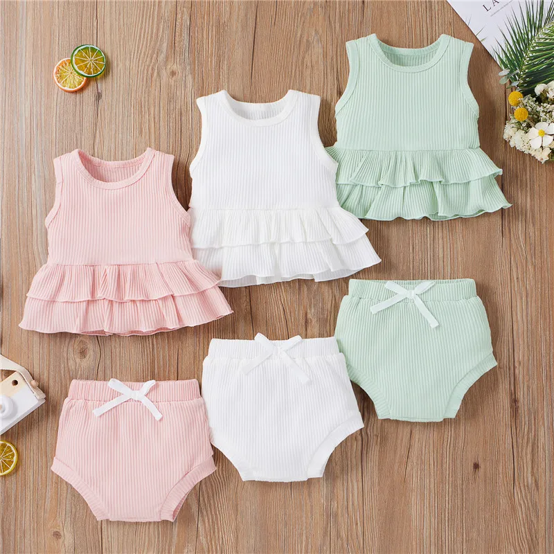 2Pcs Baby Girl Summer Outfits, Solid Color Sleeveless Ruffle Tank Tops + Bow Shorts Set
2Pcs Baby Girl Summer Outfits, Solid Color Sleeveless Ruffle Tank Tops + Bow Shorts Set