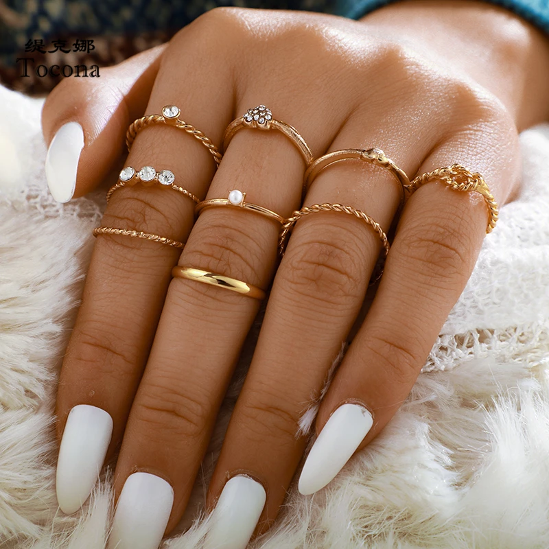 Tocona Luxury Heart Clear Crystal Stone Rings for Women Twist Pearl Hollow Geometric Wedding Rings Jewelry Accessories 9015
Tocona Luxury Heart Clear Crystal Stone Rings for Women Twist Pearl Hollow Geometric Wedding Rings Jewelry Accessories 9015