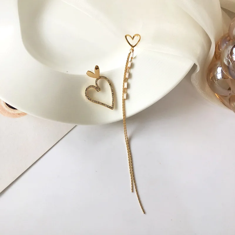 Rhinestone Tassel Very Long Cute Earrings New Temperament Asymmetric Designer Earrings 
Rhinestone Tassel Very Long Cute Earrings New Temperament Asymmetric Designer Earrings