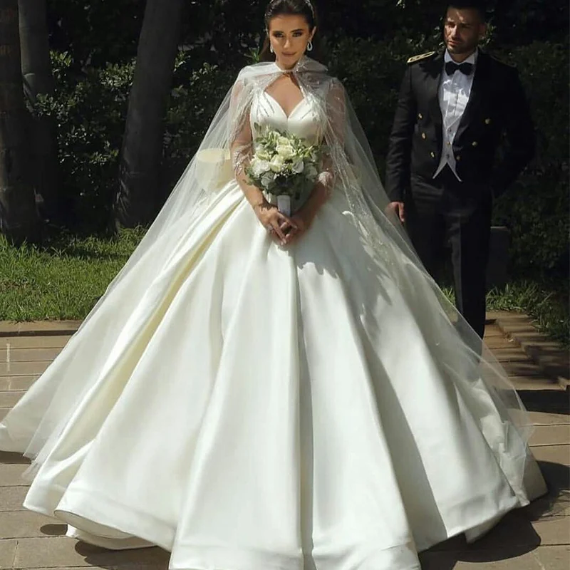 Роскошное бальное платье в арабском стиле, свадебные платья с запахом, атласные бусины, платье невесты на заказ с V-образным вырезом и бантом, 2021
Роскошное бальное платье в арабском стиле, свадебные платья с запахом, атласные бусины, платье невесты на заказ с V-образным вырезом и бантом, 2021