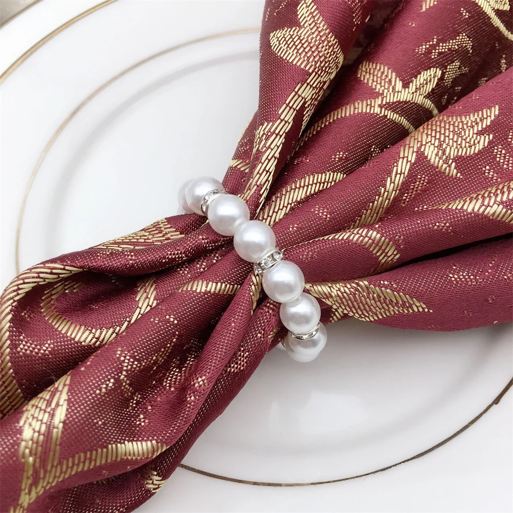 Handmade Beaded Elastic Pearl Napkin Ring Napkin Buckle For Parties Weddings Table Decor
Handmade Beaded Elastic Pearl Napkin Ring Napkin Buckle For Parties Weddings Table Decor
