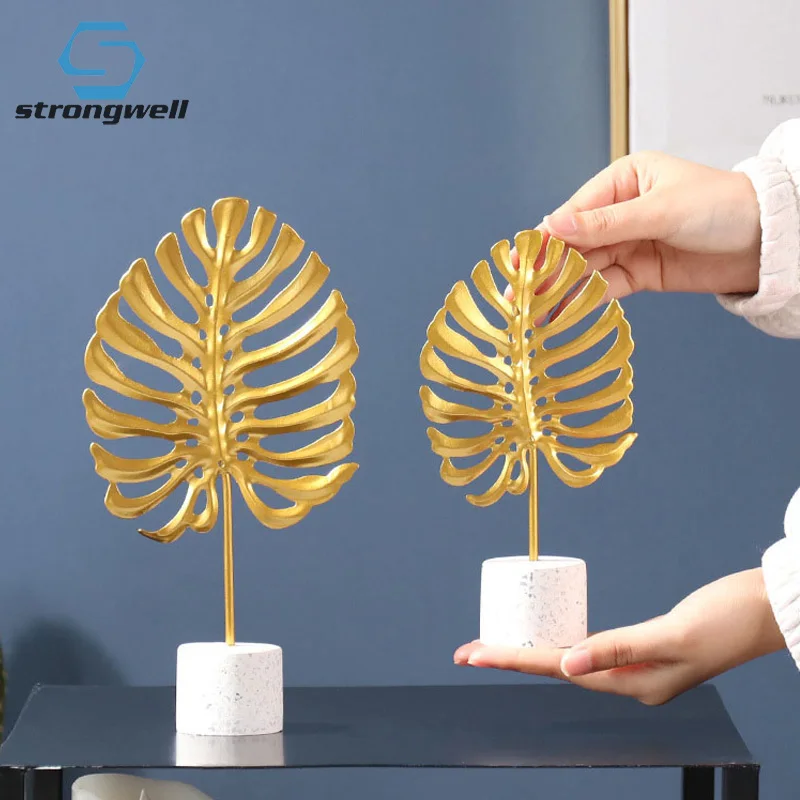 Strongwell Nordic Golden Iron Imitation Monstera Leaf Abstract Sculpture Wedding Desktop Metal Plant Crafts Home Decoration
Strongwell Nordic Golden Iron Imitation Monstera Leaf Abstract Sculpture Wedding Desktop Metal Plant Crafts Home Decoration