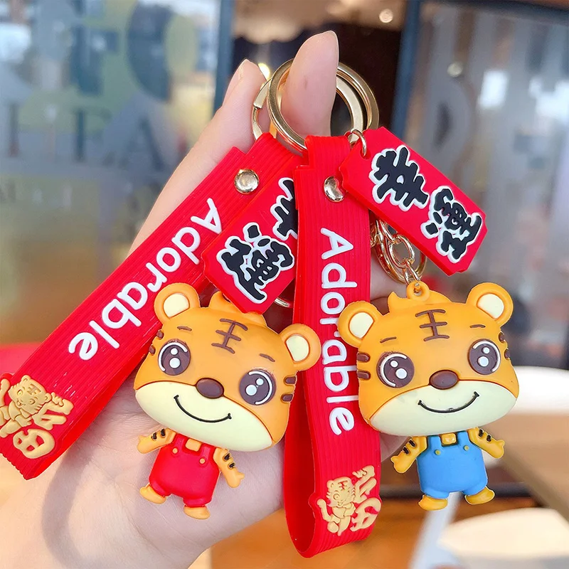 Модный брелок «Тигр», аксессуары на удачу, ювелирные изделия для мужчин и женщин, подарок на Новый год, юбилей, мультяшный брелок кукла Тигр
Модный брелок «Тигр», аксессуары на удачу, ювелирные изделия для мужчин и женщин, подарок на Новый год, юбилей, мультяшный брелок кукла Тигр