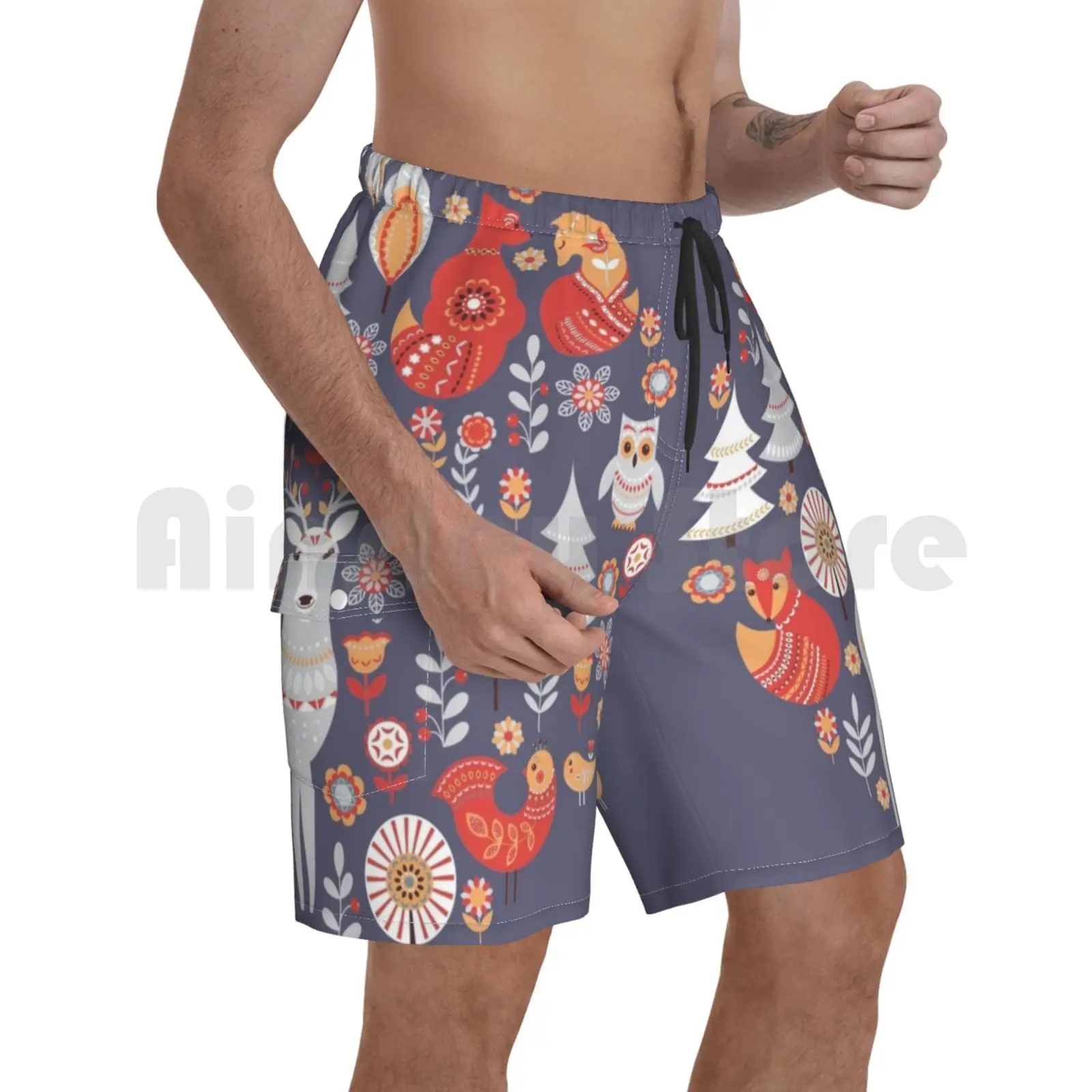 

Beach Shorts Fairy-Tale Forest. Foxes , Deer , Birds , Owls , Flowers And Herbs On A Blue Background. Beach Shorts