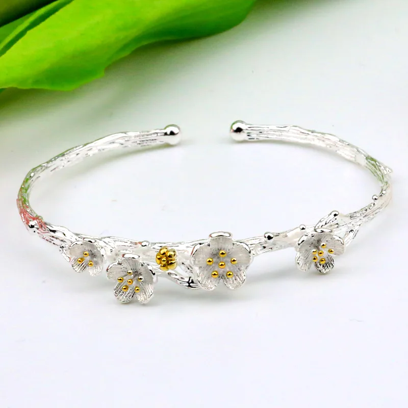 Wholesale 925 Sterling Silver Drawing Color Separation Cherry Blossoms Opening Lace Bracelet Woman Bracelet
Wholesale 925 Sterling Silver Drawing Color Separation Cherry Blossoms Opening Lace Bracelet Woman Bracelet