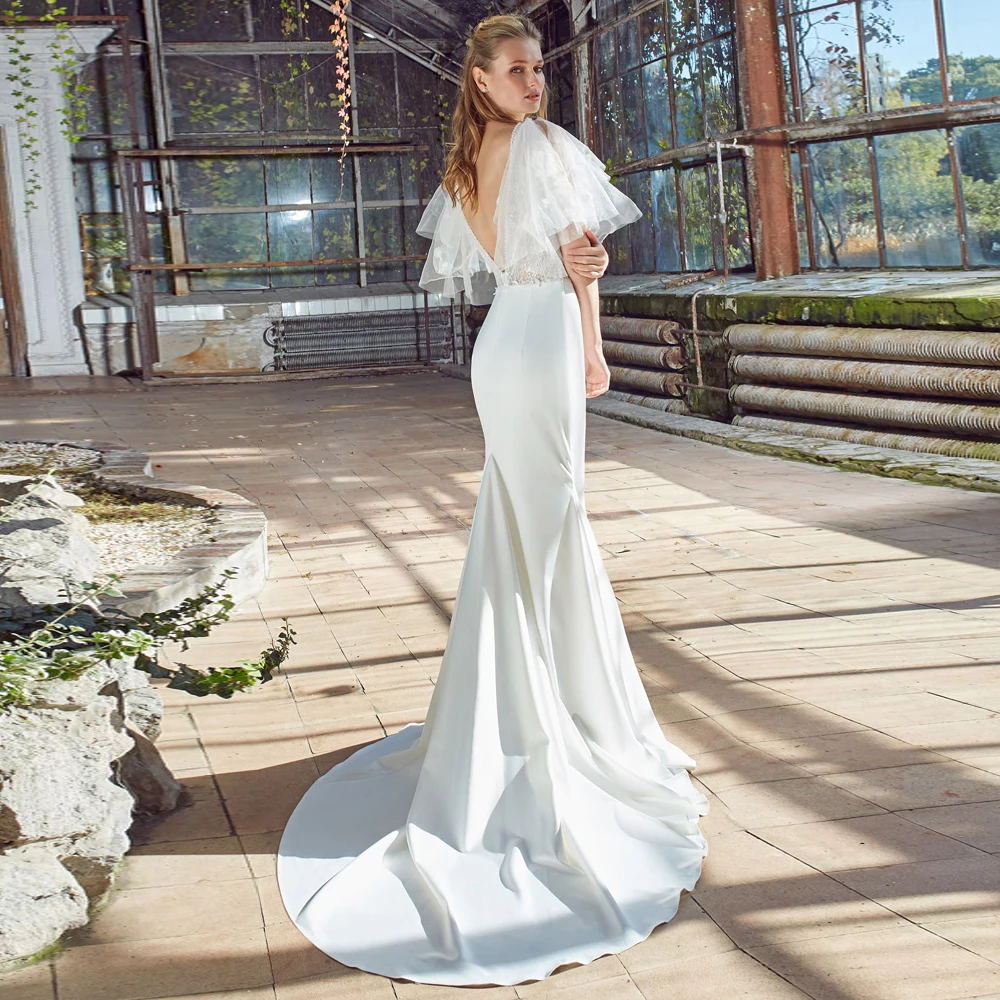 Vestidos Elegant Wedding Dresses Jersey Appliques Bateau Backless Short Sleeve Mermaid Sweep Train Bridal Gowns
Vestidos Elegant Wedding Dresses Jersey Appliques Bateau Backless Short Sleeve Mermaid Sweep Train Bridal Gowns