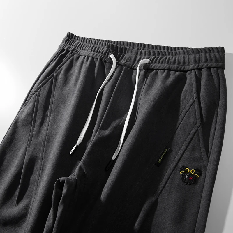 Brand Men Clothing Kpop Clothes Men's Streetwear Casual Sports Pants Hip-Hop Loose Harem Tie Pants Male Black Gray Trousers 
Brand Men Clothing Kpop Clothes Men's Streetwear Casual Sports Pants Hip-Hop Loose Harem Tie Pants Male Black Gray Trousers