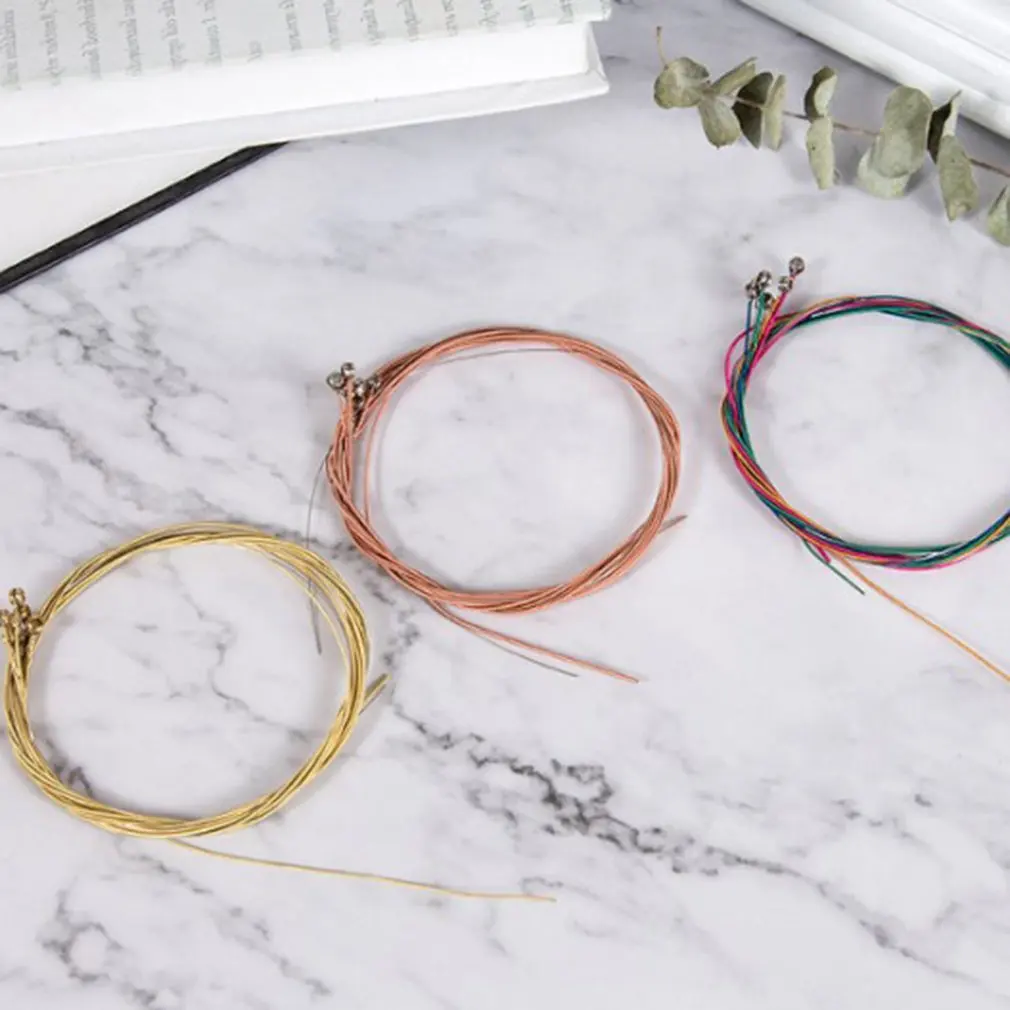 1 Set 6Pcs Rainbow Colorful Guitar Strings E-A for Acoustic Folk Guitar Classic Guitar Multi Color Guitar Parts 
1 Set 6Pcs Rainbow Colorful Guitar Strings E-A for Acoustic Folk Guitar Classic Guitar Multi Color Guitar Parts