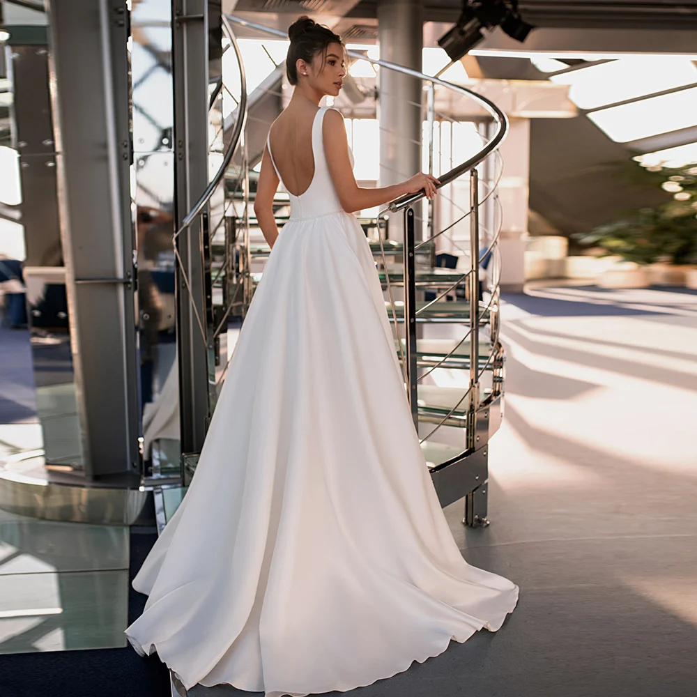 2021 Wedding Dress Vestido De Mariee Sexy Squre Neck Sleeveless Beading Belt Simple Backless Satin Bridal Gown
2021 Wedding Dress Vestido De Mariee Sexy Squre Neck Sleeveless Beading Belt Simple Backless Satin Bridal Gown