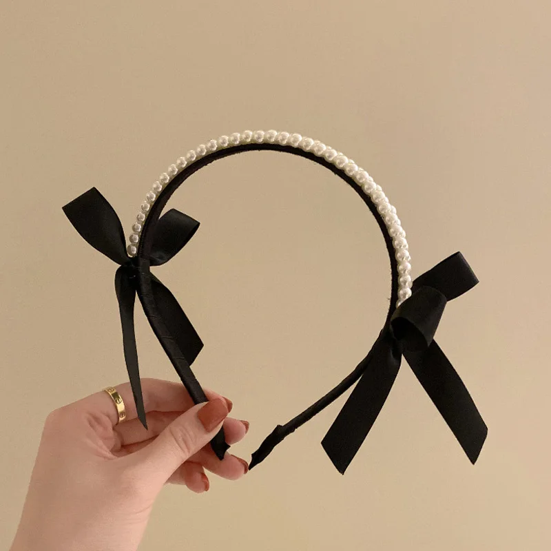 Black Pearl Bow Hair Band Summer High-level Sense Of Retro French Temperament Pressure Hair Headband Korean Headdress Women Cute
Black Pearl Bow Hair Band Summer High-level Sense Of Retro French Temperament Pressure Hair Headband Korean Headdress Women Cute