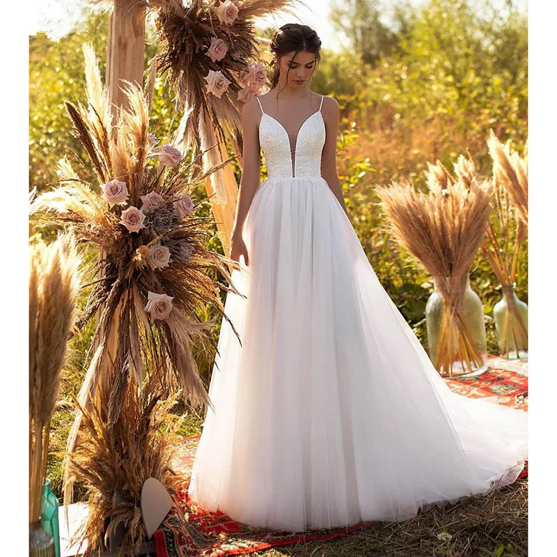 TIXLEAR Simple Elegent Beach Wedding Dresses 2022 V-Neck Spaghetti Strap Tulle Backless Bridal Gowns Vestido De Noiva
TIXLEAR Simple Elegent Beach Wedding Dresses 2022 V-Neck Spaghetti Strap Tulle Backless Bridal Gowns Vestido De Noiva