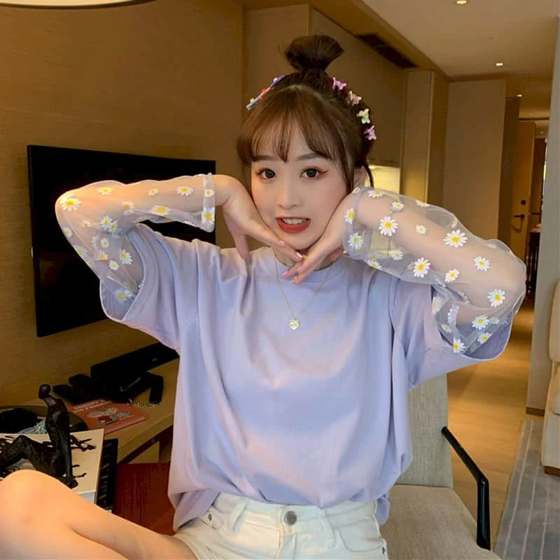 Fake two small daisy short-sleeved T-shirt women's summer 2020 new loose top women long-sleeved Korean student half-sleeved
Fake two small daisy short-sleeved T-shirt women's summer 2020 new loose top women long-sleeved Korean student half-sleeved