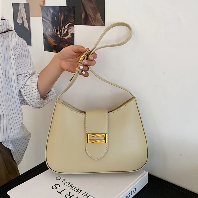 Fashion Mental Buckle Baguette Shoulder Bags For Women Hafl Moon Designer Handbags High Quality Small Girl Tote Bags 2021 Summer
Fashion Mental Buckle Baguette Shoulder Bags For Women Hafl Moon Designer Handbags High Quality Small Girl Tote Bags 2021 Summer