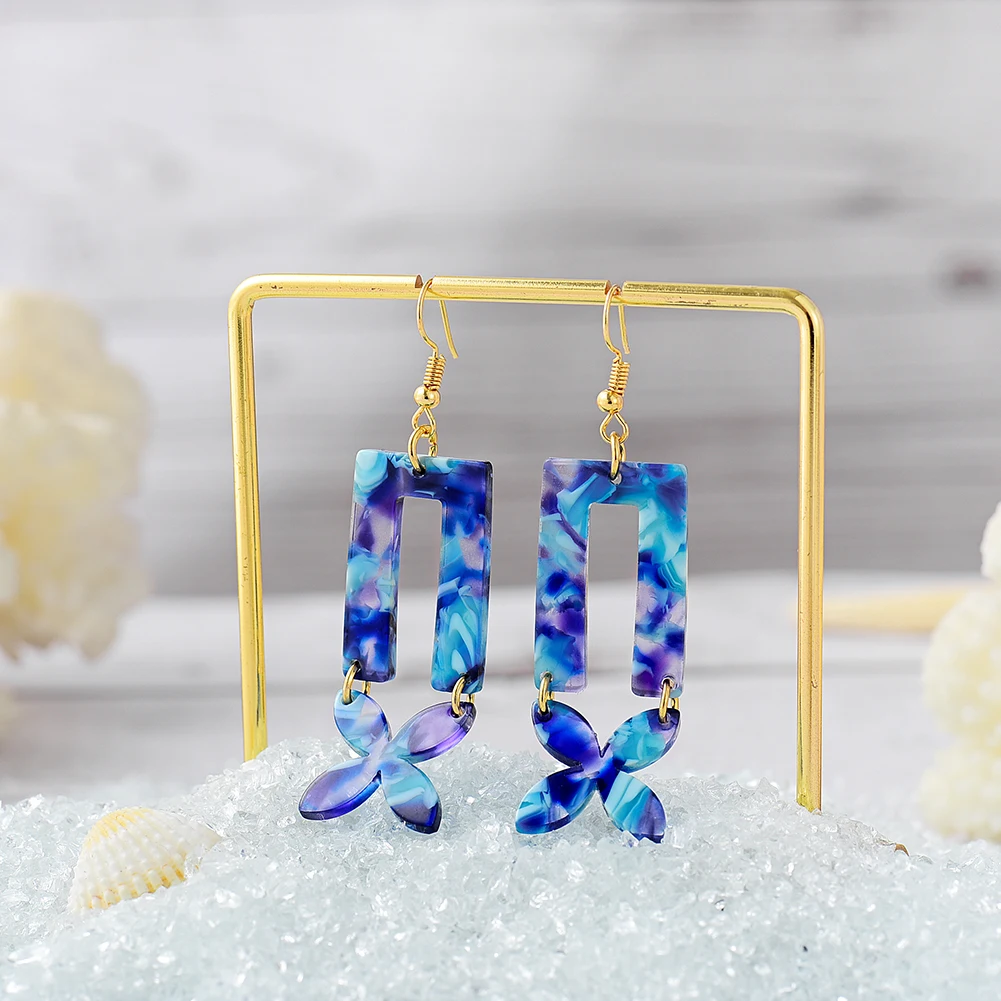 Cring Coco Earring 2021 trend Hawaiian Fashion Jewelry Blue Acrylic Earring Design Coss Dangling Earrings for Women Jewelry
Cring Coco Earring 2021 trend Hawaiian Fashion Jewelry Blue Acrylic Earring Design Coss Dangling Earrings for Women Jewelry