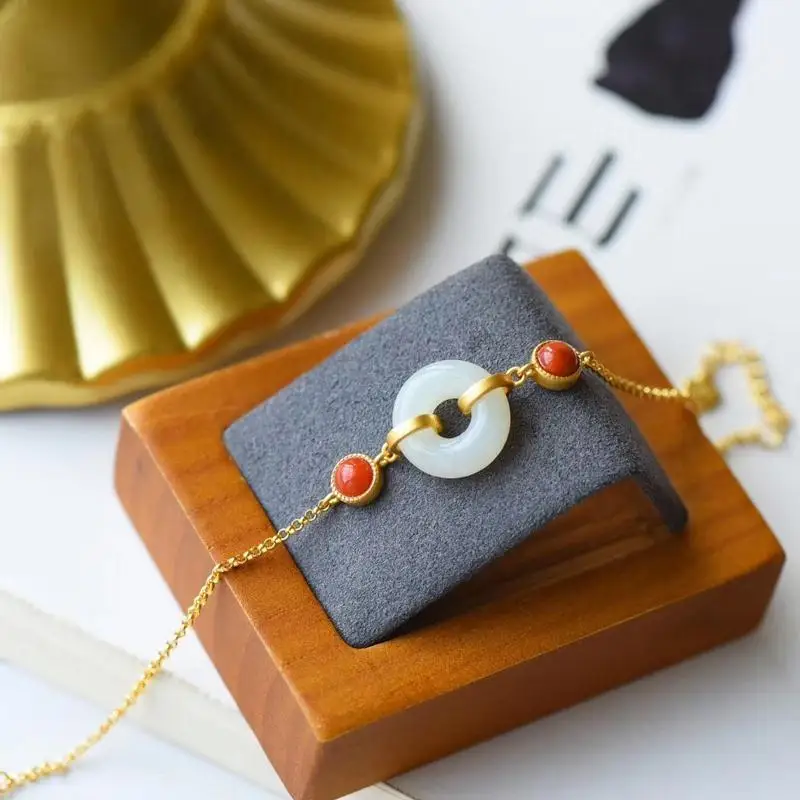 Natural Hetian White Jade Ring Safety Buckle Bracelet with South Red Fashion Simple S925 Sterling Silver Ancient Gold Craft
Natural Hetian White Jade Ring Safety Buckle Bracelet with South Red Fashion Simple S925 Sterling Silver Ancient Gold Craft