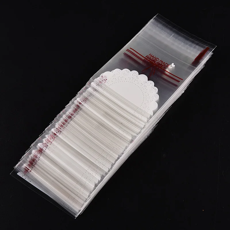 100pcs Lovely lace bow Print Gifts Bags Christmas packaging self-adhesive plastic bags Candy Cake package Stationery Holder
100pcs Lovely lace bow Print Gifts Bags Christmas packaging self-adhesive plastic bags Candy Cake package Stationery Holder